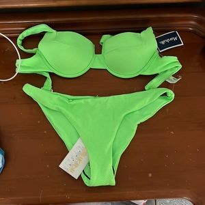 NWT Marshalls bathing suit. Brand is Tini Bikini Swimwear